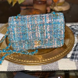 Tweed teal green and pink bag in like new condition
